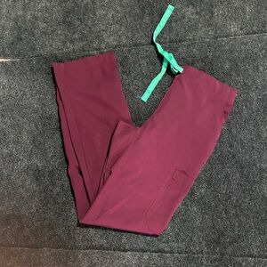 Maroon scrub bottoms with Teal Tie